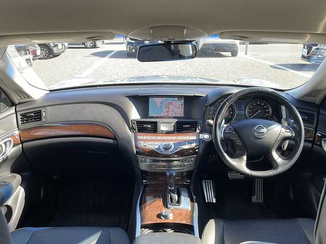 日産 フーガ 370GT タイプS 島根県 2012(平24)年 7.1万km ブリリアントシルバー メーカーナビゲーション/フルセグ BT CD DVD/クルーズコントロール/パドルシフト/バックカメラ/D/N席パワーシート/ビルトインETC/HIDヘッドライト/AUTOライト/フォグライト/ハーフレザーシート(合皮)/革巻きステアリング/ステアリングリモコン/ISOFIX/純正20インチアルミホイール