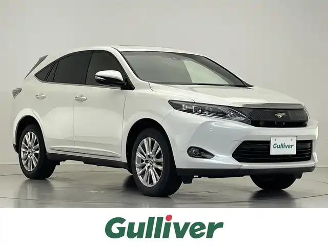 トヨタ ハリアー プレミアム アドバンスドP 滋賀県 2016(平28)年 9.5万km ホワイトパールクリスタルシャイン 禁煙車/サンルーフ/純正9型ナビ/（CD/DVD/フルセグTV/BT/SD/AUX/USB/FM/AM）/トヨタセーフティセンス/・プリクラッシュセーフティ/・レーンディパーチャーアラート/・レーダークルーズコントロール/・オートマチックハイビーム/JBLサウンド/バック/サイドカメラ/ビルトインETC/パワーバックドア/ハーフレザーシート/ウッドコンビステアリング/D席パワーシート/デュアルエアコン/社外フロアマット/純正18インチAW