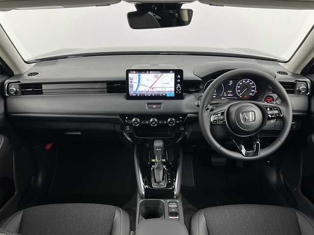 ホンダ ヴェゼル ハイブリッド e:HEV Z 熊本県 2025(令7)年 0.1千km クリスタルブラックパール ・純正９インチメモリナビ/・BT/USB/フルセグTV/・バックカメラ/・ホンダセンシング/・衝突軽減ブレーキ/・路外逸脱抑制機能/・クリアランスソナー/・横滑り防止装置/・ブラインドスポットモニター/・アダプティブクルーズコントロール/・ダウンヒルアシストコントロール/・前後コーナーセンサー/・パドルシフト/・パワーバックドア/・前席シートヒーター/・ステアリングヒーター/・ハーフレザーシート/・置くだけ充電/・オートマチックハイビーム/・LEDヘッドライト/・オートライト/・フォグランプ/・ETC2.0/・純正１８インチアルミホイール/・スマートキー/・スペアキー/・W＋サイドエアバッグ/・カーテンエアバッグ