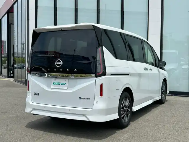 日産 セレナ e－パワー ハイウェイスター V 大阪府 2025(令7)年 0.1万km未満 プリズムホワイト 純正１２．３インチナビ/   フルセグTV/Bluetooth/USB/衝突軽減/ＢＳＭ/プロパイロット/全方位モニター/後席モニター/スマートルームミラー/両側パワースライドドア/アイドリングストップ/ワイヤレス充電/ドライブレコーダー/コーナーセンサー/純正16インチアルミホイール/純正フロアマット/スマートキー/ＥＴＣ/ＬＥＤライト