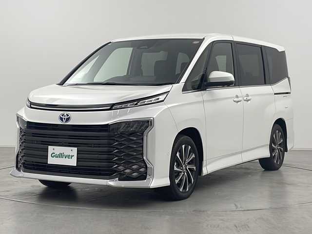 トヨタ ヴォクシー ハイブリッド S－Z 群馬県 2025(令7)年 0.1万km未満 ホワイトパールクリスタルシャイン 登録済未使用車　純正１０．５型ナビ　全周囲カメラ　ＣＤ／ＤＶＤ　両側電動スライドドア　アダプティブクルーズコントロール　ＡＣ１００Ｖ　トヨタチームメイト　ハーフレザーシート　ビルトインＥＴＣ　禁煙車
