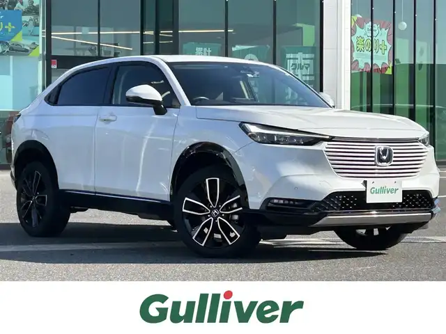 ホンダ ヴェゼル ハイブリッド e:HEV Z 島根県 2022(令4)年 5.3万km パール ホンダセンシング /社外10インチナビ/CD/DVD/DTV/Bluetooth/バックカメラ/レーダークルーズコントロール/LEDオートライト/コーナーセンサー /BSM/ビルトインETC/前後ドライブレコーダー/ステアリングスイッチ/ステアリングヒーター/パドルシフト/ハーフレザー調シート/シートヒーター /純正アルミホイール/純正フロアマット/スマートキー/プッシュスタート