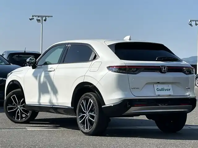 ホンダ ヴェゼル ハイブリッド e:HEV Z 島根県 2022(令4)年 5.3万km パール ホンダセンシング /社外10インチナビ/CD/DVD/DTV/Bluetooth/バックカメラ/レーダークルーズコントロール/LEDオートライト/コーナーセンサー /BSM/ビルトインETC/前後ドライブレコーダー/ステアリングスイッチ/ステアリングヒーター/パドルシフト/ハーフレザー調シート/シートヒーター /純正アルミホイール/純正フロアマット/スマートキー/プッシュスタート