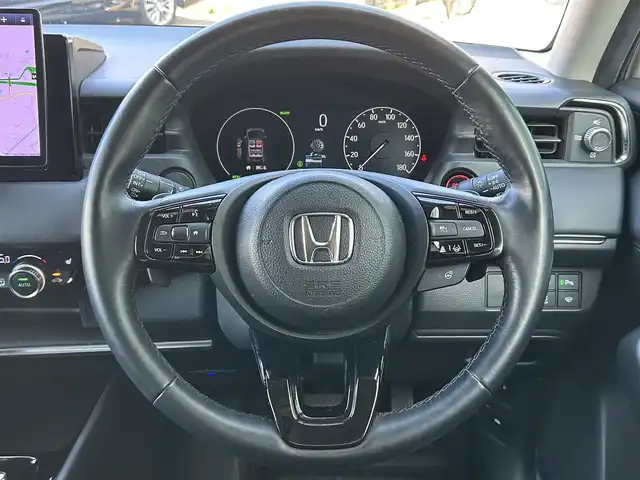 ホンダ ヴェゼル ハイブリッド e:HEV Z 島根県 2022(令4)年 5.3万km パール ホンダセンシング /社外10インチナビ/CD/DVD/DTV/Bluetooth/バックカメラ/レーダークルーズコントロール/LEDオートライト/コーナーセンサー /BSM/ビルトインETC/前後ドライブレコーダー/ステアリングスイッチ/ステアリングヒーター/パドルシフト/ハーフレザー調シート/シートヒーター /純正アルミホイール/純正フロアマット/スマートキー/プッシュスタート