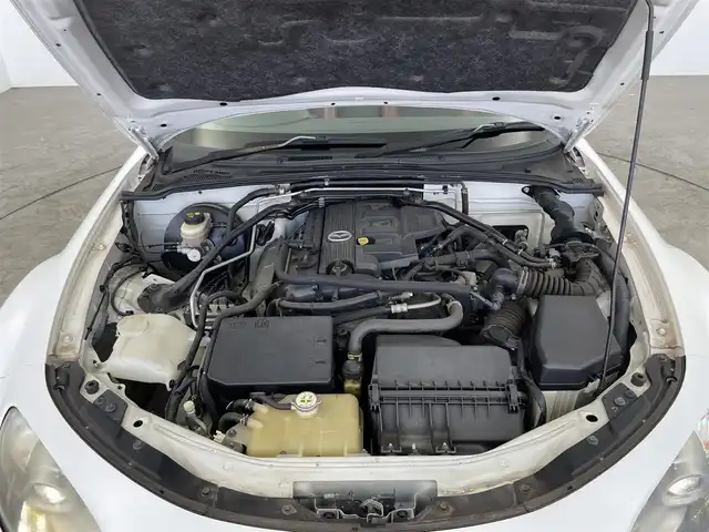 マツダ ロードスター 20周年記念車 大分県 2010(平22)年 7.5万km クリスタルホワイトパールマイカ 社外ナビ/（ワンセグ/AM/FM/Bluetooth）/6速マニュアル/レザーシート/シートヒーター/ETC/ステアリングスイッチ/純正アルミホイール/オートエアコン/オートウインドウ/保証書・取扱説明書/スペアキー
