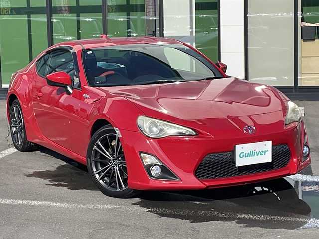 トヨタ ８６ GT 道東・釧路十勝 2012(平24)年 7万km ライトニングレッド ・6速MT/・社外ナビ(CD/DVD/TV/BT/AM/FM)/・フルセグテレビ/・前後ドラレコ/・社外レーダー/・横滑り防止機能/・オートライト/・LEDヘッドライト/・フロントフォグ/・電動格納ミラー/・社外フロアマット/・ドアバイザー/・社外AW付冬タイヤ積み込み/（205/60/R16/2018年5分山)
