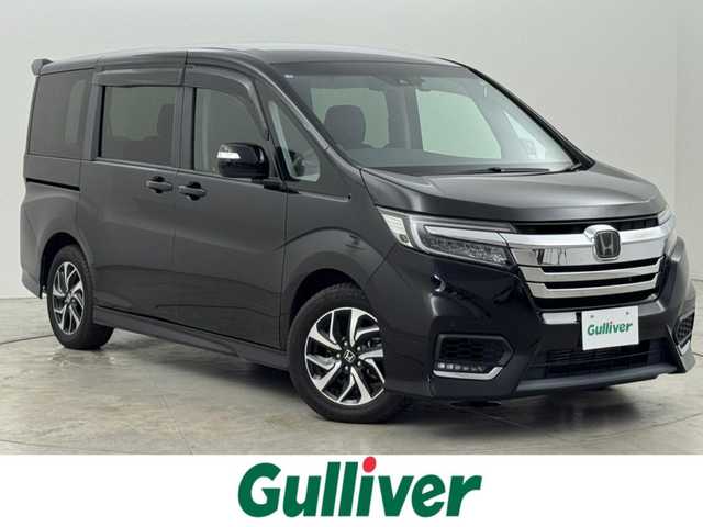 ホンダ ステップワゴン スパーダ ホンダセンシング 熊本県 2020(令2)年 5.9万km プレミアムスパークルブラックパール ワンオーナー　/後席モニター　/純正８型ナビ　/バックカメラ　/ビルトインＥＴＣ２．０　/前方ドラレコ　/コーナーセンサー　/アダプティブクルコン　/ホンダセンシング　/衝突被害軽減　/レーンキープ　/両側電動スライドドア