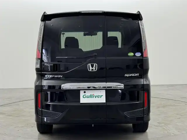 ホンダ ステップワゴン スパーダ ホンダセンシング 熊本県 2020(令2)年 5.9万km プレミアムスパークルブラックパール ワンオーナー　/後席モニター　/純正８型ナビ　/バックカメラ　/ビルトインＥＴＣ２．０　/前方ドラレコ　/コーナーセンサー　/アダプティブクルコン　/ホンダセンシング　/衝突被害軽減　/レーンキープ　/両側電動スライドドア