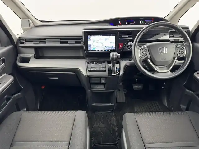 ホンダ ステップワゴン スパーダ ホンダセンシング 熊本県 2020(令2)年 5.9万km プレミアムスパークルブラックパール ワンオーナー　/後席モニター　/純正８型ナビ　/バックカメラ　/ビルトインＥＴＣ２．０　/前方ドラレコ　/コーナーセンサー　/アダプティブクルコン　/ホンダセンシング　/衝突被害軽減　/レーンキープ　/両側電動スライドドア