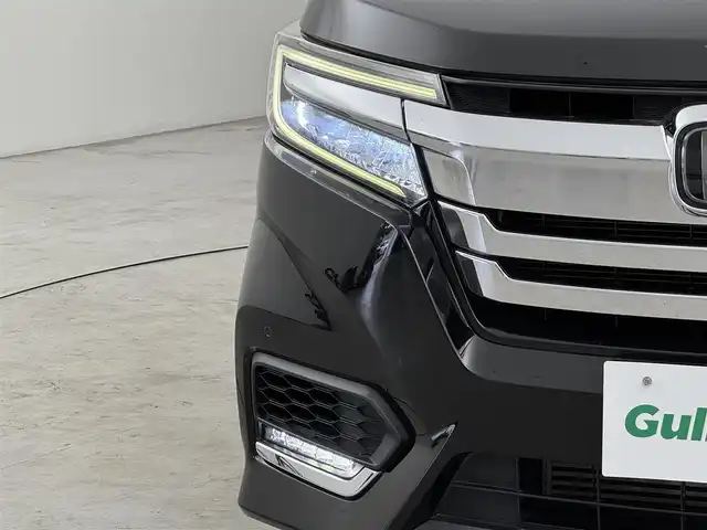 ホンダ ステップワゴン スパーダ ホンダセンシング 熊本県 2020(令2)年 5.9万km プレミアムスパークルブラックパール ワンオーナー　/後席モニター　/純正８型ナビ　/バックカメラ　/ビルトインＥＴＣ２．０　/前方ドラレコ　/コーナーセンサー　/アダプティブクルコン　/ホンダセンシング　/衝突被害軽減　/レーンキープ　/両側電動スライドドア