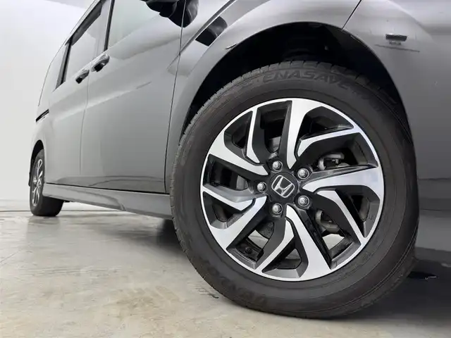 ホンダ ステップワゴン スパーダ ホンダセンシング 熊本県 2020(令2)年 5.9万km プレミアムスパークルブラックパール ワンオーナー　/後席モニター　/純正８型ナビ　/バックカメラ　/ビルトインＥＴＣ２．０　/前方ドラレコ　/コーナーセンサー　/アダプティブクルコン　/ホンダセンシング　/衝突被害軽減　/レーンキープ　/両側電動スライドドア