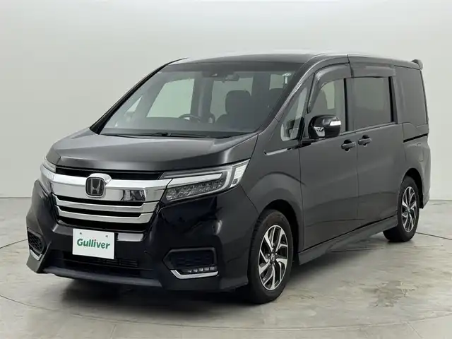 ホンダ ステップワゴン スパーダ ホンダセンシング 熊本県 2020(令2)年 5.9万km プレミアムスパークルブラックパール ワンオーナー　/後席モニター　/純正８型ナビ　/バックカメラ　/ビルトインＥＴＣ２．０　/前方ドラレコ　/コーナーセンサー　/アダプティブクルコン　/ホンダセンシング　/衝突被害軽減　/レーンキープ　/両側電動スライドドア