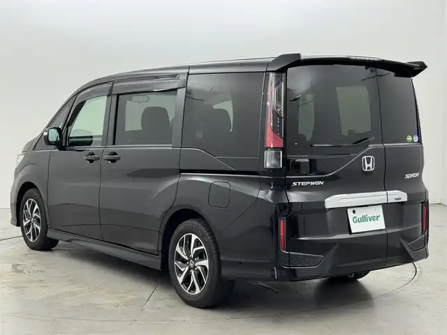 ホンダ ステップワゴン スパーダ ホンダセンシング 熊本県 2020(令2)年 5.9万km プレミアムスパークルブラックパール ワンオーナー　/後席モニター　/純正８型ナビ　/バックカメラ　/ビルトインＥＴＣ２．０　/前方ドラレコ　/コーナーセンサー　/アダプティブクルコン　/ホンダセンシング　/衝突被害軽減　/レーンキープ　/両側電動スライドドア
