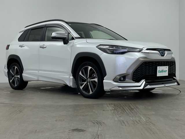 トヨタ カローラ クロス Z 鹿児島県 2023(令5)年 2.9万km プラチナホワイトパールマイカ ワンオーナー/純正ディスプレイオーディオ/モデリスタエアロ/パノラマルーフ/パノラミックビューモニター/レーダークルーズコントロール/プリクラッシュセーフティ/レーンキープアシスト/パワーバックドア/オートライト/オートマチックハイビーム/ハーフレザーシート/パワーシート/シートヒーター