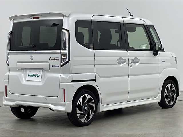 スズキ スペーシア カスタム HYBRID XS 道央・札幌 2024(令6)年 0.7万km ピュアホワイトP ・4WD/・純正ナビ&CD&DVD&SD&BT&TV/・両側パワースライドドア/・スズキセーフティサポート/・レーダークルーズコントロール/・コーナーセンサー/・ヘッドアップディスプレイ/・アイドリングストップ/・横滑り防止装置/・前席シートヒーター/・ステアリングヒーター/・LEDヘッドライト/・オートライト/・スマートキー