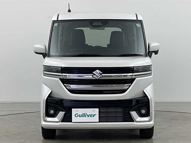 スズキ スペーシア カスタム HYBRID XS 道央・札幌 2024(令6)年 0.7万km ピュアホワイトP ・4WD/・純正ナビ&CD&DVD&SD&BT&TV/・両側パワースライドドア/・スズキセーフティサポート/・レーダークルーズコントロール/・コーナーセンサー/・ヘッドアップディスプレイ/・アイドリングストップ/・横滑り防止装置/・前席シートヒーター/・ステアリングヒーター/・LEDヘッドライト/・オートライト/・スマートキー