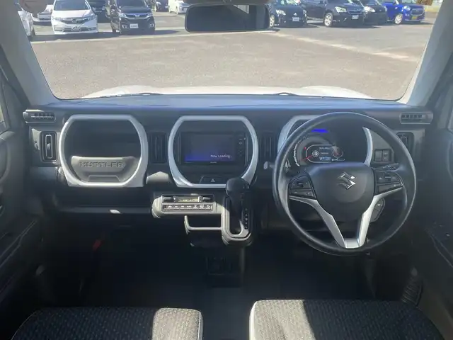 スズキ ハスラー HYBRID G 熊本県 2023(令5)年 1.2万km ピュアホワイトP 社外ナビ/・AM/FM/CD/DVD/BT/・フルセグTV/衝突軽減ブレーキ/レーンキープアシスト/オートライト/レーダークルーズコントロール/前席シートヒーター/純正アルミホイール/電動格納ミラー/ステアリングスイッチ/アイドリングストップ/プッシュスタート/スマートキー