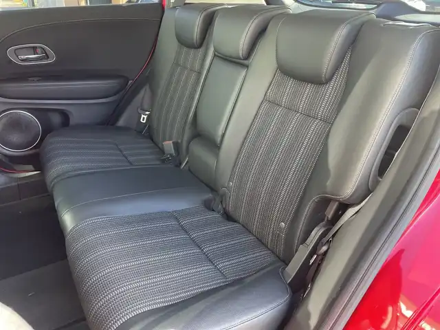 ホンダ ヴェゼル ハイブリッド Z ホンダセンシング 神奈川県 2017(平29)年 5.4万km プレミアムクリスタルレッドM 純正メモリナビ（VXM-175VFi）/Bluetooth/CD/DVD/フルセグ/USB/追従式クルーズコントロール/前席シートヒーター/パドルシフト/パーキングセンサー/ルーフレール/LEDヘッドライト/LEDフォグランプ/ブレーキホールド/シートポジションメモリー/プッシュスタート/スマートキー/純正アルミホイール/純正フロアマット/ETC/電動格納ミラー/ドアバイザー/横滑り防止装置/レーンキープアシスト/衝突被害軽減システム