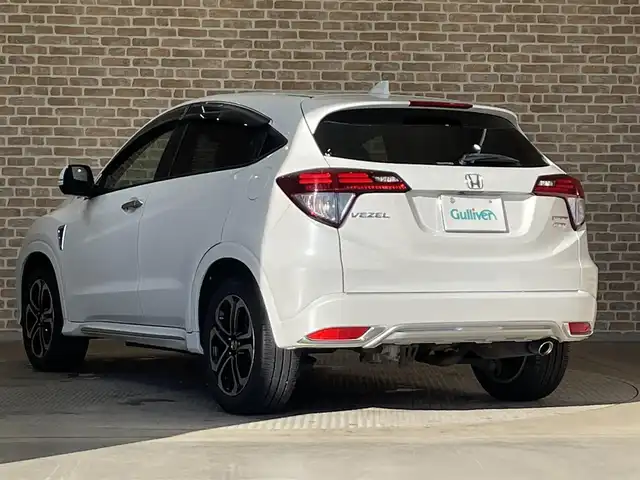 ホンダ ヴェゼル ハイブリッド 岩手県 2017(平29)年 11.6万km ホワイトオーキッドパール ワンオーナー/４WD/パドルシフト/レーンアシスト/衝突被害軽減ブレーキ/横滑り防止装置/バックカメラ/リアクティブフォースペダル/クルーズコントロール/フロントワイパーデアイサー/チップアップリアシート/オールオートパワーウィンドウ/シートヒーター/ETC/ドライブレコーダー/ハーフレザーシート/純正フロアマット/純正１７インチアルミホイール/純正LEDヘッドライト