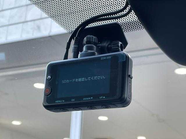 トヨタ ヴォクシー ハイブリッド S－Z 山形県 2025(令7)年 0.9万km アティチュードブラックマイカ 4WD/トヨタセーフティセンス/快適パッケージ/MODELLISTAフルエアロ/純正メモリナビ/　　【CD　DVD　BT　フルセグ　USB】/バックカメラ/両側パワースライドドア/パワーバックドア/レーダークルーズコントロール/LEDオートライト/ハーフレザーシート/シートヒーター/純正16インチアルミホイール/ステアリングスイッチ/ドライブレコーダー/スマートキー×2/ETC2.0/ワンオーナー