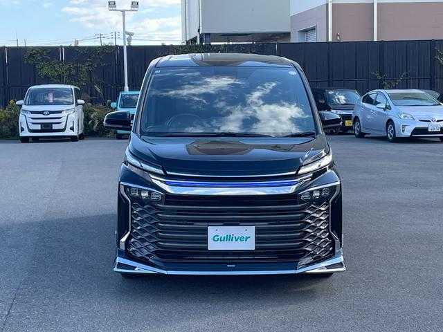 トヨタ ヴォクシー ハイブリッド S－Z 山形県 2025(令7)年 0.9万km アティチュードブラックマイカ 4WD/トヨタセーフティセンス/快適パッケージ/MODELLISTAフルエアロ/純正メモリナビ/　　【CD　DVD　BT　フルセグ　USB】/バックカメラ/両側パワースライドドア/パワーバックドア/レーダークルーズコントロール/LEDオートライト/ハーフレザーシート/シートヒーター/純正16インチアルミホイール/ステアリングスイッチ/ドライブレコーダー/スマートキー×2/ETC2.0/ワンオーナー