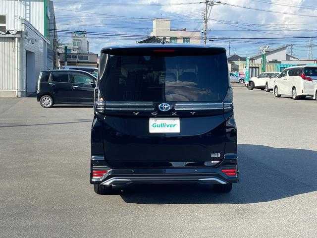 トヨタ ヴォクシー ハイブリッド S－Z 山形県 2025(令7)年 0.9万km アティチュードブラックマイカ 4WD/トヨタセーフティセンス/快適パッケージ/MODELLISTAフルエアロ/純正メモリナビ/　　【CD　DVD　BT　フルセグ　USB】/バックカメラ/両側パワースライドドア/パワーバックドア/レーダークルーズコントロール/LEDオートライト/ハーフレザーシート/シートヒーター/純正16インチアルミホイール/ステアリングスイッチ/ドライブレコーダー/スマートキー×2/ETC2.0/ワンオーナー