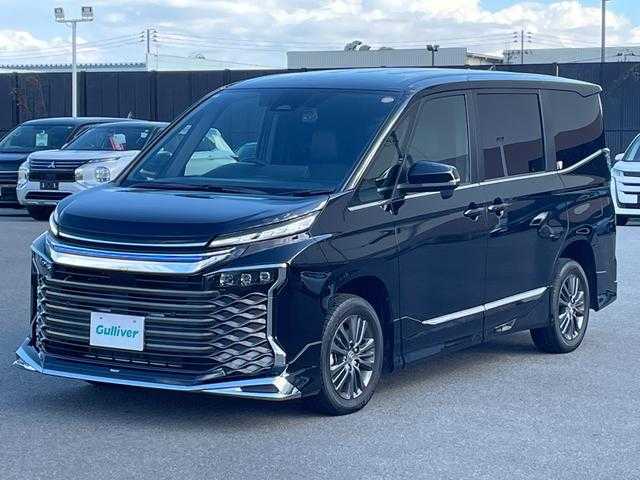 トヨタ ヴォクシー ハイブリッド S－Z 山形県 2025(令7)年 0.9万km アティチュードブラックマイカ 4WD/トヨタセーフティセンス/快適パッケージ/MODELLISTAフルエアロ/純正メモリナビ/　　【CD　DVD　BT　フルセグ　USB】/バックカメラ/両側パワースライドドア/パワーバックドア/レーダークルーズコントロール/LEDオートライト/ハーフレザーシート/シートヒーター/純正16インチアルミホイール/ステアリングスイッチ/ドライブレコーダー/スマートキー×2/ETC2.0/ワンオーナー
