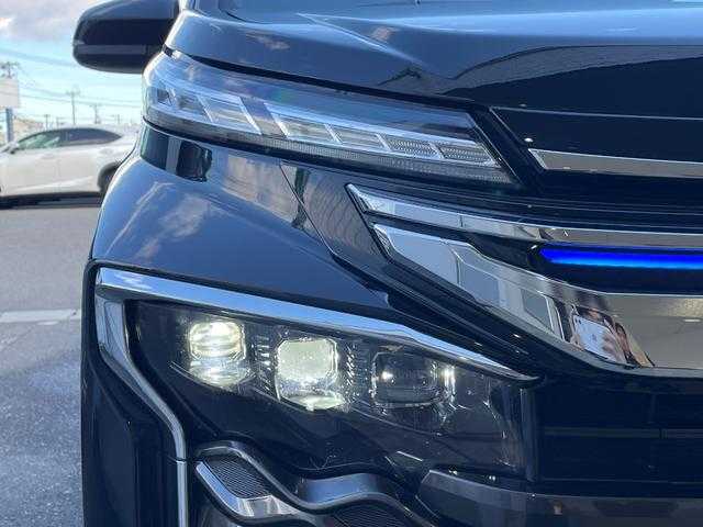 トヨタ ヴォクシー ハイブリッド S－Z 山形県 2025(令7)年 0.9万km アティチュードブラックマイカ 4WD/トヨタセーフティセンス/快適パッケージ/MODELLISTAフルエアロ/純正メモリナビ/　　【CD　DVD　BT　フルセグ　USB】/バックカメラ/両側パワースライドドア/パワーバックドア/レーダークルーズコントロール/LEDオートライト/ハーフレザーシート/シートヒーター/純正16インチアルミホイール/ステアリングスイッチ/ドライブレコーダー/スマートキー×2/ETC2.0/ワンオーナー