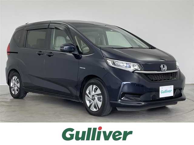 ホンダ フリード ハイブリット G ホンダセンシング 埼玉県 2020(令2)年 3.5万km ミッドナイトブルービームM 純正ナビ/バックモニター/ビルトインETC/両側パワースライドドア/ホンダセンシング/シートヒーター/LEDヘッドライト/オートライト/前席シートヒーター/レザー調シートカバー/純正フロアマット/純正ホイールキャップ（185/65R15)/プッシュスタートボタン/ステアリングリモコン/後席サンシェード