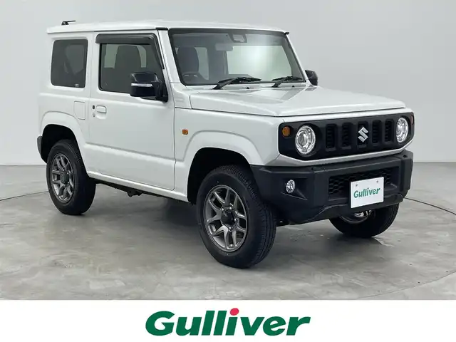 スズキ ジムニー XC 大分県 2022(令4)年 0.9万km ピュアホワイトP スズキセーフティサポート/社外ナビ（Panasonic）/Ｂｌｕｅｔｏｏｔｈ/CD/DVD/フルセグ/クルーズコントロール/シートヒーター（D＋N）/ＥＴＣ　/ステアリングスイッチ/ダウンヒルアシストコントロール/アイドリングストップ/純正１６ＡＷ/オートＬＥＤライト/フォグランプ/スマートキー/スペアキー
