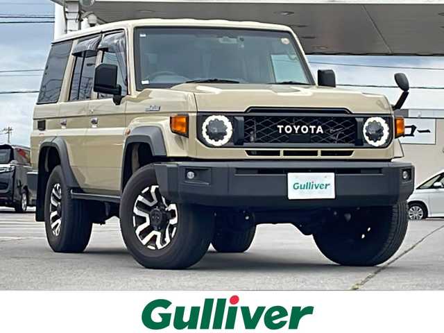 トヨタ ランドクルーザー AX 道北・旭川 2024(令6)年 3.3万km ベージュ /禁煙車//ワンオーナー//純正ナビ/CD/DVD/SD/BT/TV//トヨタセーフティーセンス/LDA/PCS/RSA//バックカメラ//ETC//社外ドライブレコーダー//純正フロアマット//ハーフレザーシート//木目調革巻きコンビステアリング//ステアリングスイッチ//クルーズコントロール//オートライト//LEDヘッドライト//LEDフォグランプ//オートハイビーム//スペアキー//保証書//取扱説明書