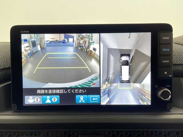 ホンダ ステップワゴン エアー EX 長野県 2025(令7)年 0.1千km プラチナホワイトパール 4WD/純正メモリナビ/（フルセグTV＆BL＆AppleCarPay＆AndroidAuto＆USB＆FM・AM）/全周囲カメラ/寒冷地仕様/クルーズコントロール（追従あり）/レーンキープアシスト/衝突被害軽減システム/クリアランスソナー/両側パワースライドドア/オットマン（2列目）/サンシェード（2列目）/パドルシフト/電動パーキングブレーキ/ブレーキホールド/LEDヘッドライト/オートマチックハイビーム/フォグランプ/ドアバイザー/ETC/シートヒーター（前席）/スマートキー/スペアキー