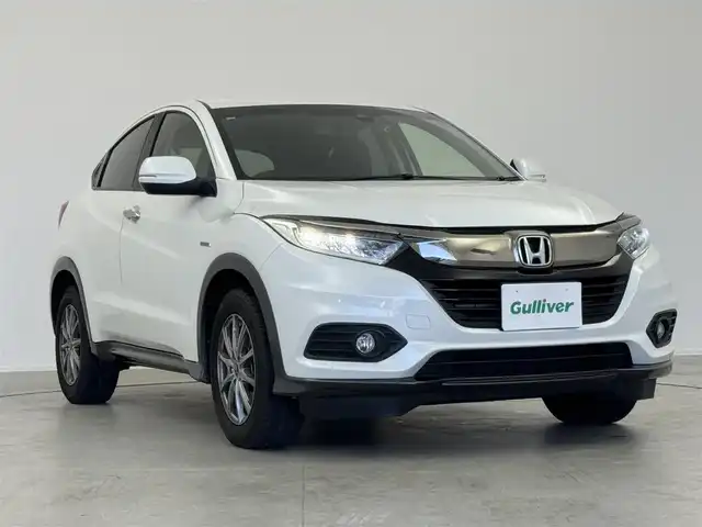 ホンダ ヴェゼル ハイブリッド X ホンダセンシング 愛知県 2018(平30)年 5.6万km プラチナホワイトパール 純正ナビ　/（フルセグ／ＢＴ／ＣＤ／ＤＶＤ） /レーダークルーズコントロール　/パドルシフト　/バックモニター　/衝突軽減システム　/レーンキープアシスト　/電動格納ミラー　/ステアリングスイッチ　/ドライブレコーダー　/ETC　/社外AW