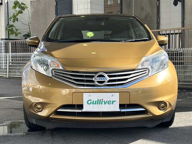日産 ノート メダリスト X 京都府 2015(平27)年 6.6万km ビートニックゴールド 純正7インチナビ/フルセグTV/Bluetooth Audio/衝突軽減装置/レーンキープアシスト/禁煙車/ハーフレザーシート/ウインカーミラー/アイドリングストップ/ETC/オートライト/純正フロアマット/純正ホイールカバー/リアワイパー/取扱説明書/スマートキースペア
