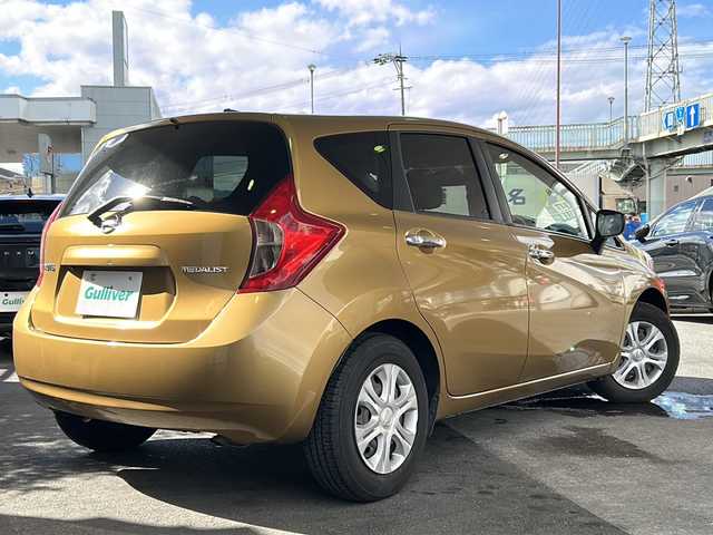 日産 ノート メダリスト X 京都府 2015(平27)年 6.6万km ビートニックゴールド 純正7インチナビ/フルセグTV/Bluetooth Audio/衝突軽減装置/レーンキープアシスト/禁煙車/ハーフレザーシート/ウインカーミラー/アイドリングストップ/ETC/オートライト/純正フロアマット/純正ホイールカバー/リアワイパー/取扱説明書/スマートキースペア