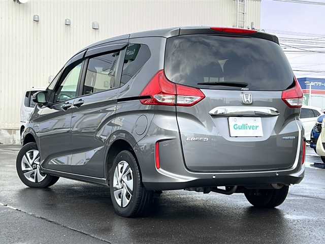 ホンダ フリード ハイブリット G ホンダセンシング 道北・旭川 2021(令3)年 6.4万km スーパープラチナグレーメタリック /４WD//禁煙車//寒冷地仕様//ワンオーナー//純正メモリナビ/CD/DVD/SD/BT/USB/TV/ラジオ//バックカメラ//ビルトインETC//両側パワースライドドア//前席シートヒーター//電動格納ミラー//オートエアコン//ミラーヒーター//フロントデアイサー//ホンダセンシング/衝突軽減ブレーキ/誤発進抑制機能/後方誤発進抑制機能/標識認識機能/先行車お知らせ機能/路外逸脱抑制機能/LKAS/ACC/オートハイビーム//エコモード//ステアリングスイッチ//オートライト//LEDヘッドライト//ミラーウィンカー//ドアバイザー//純正フロアマット//スペアキー
