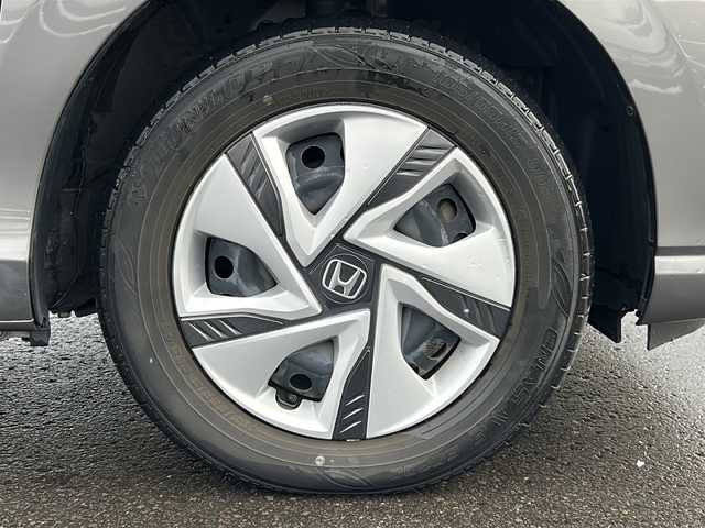 ホンダ フリード ハイブリット G ホンダセンシング 道北・旭川 2021(令3)年 6.4万km スーパープラチナグレーメタリック /４WD//禁煙車//寒冷地仕様//ワンオーナー//純正メモリナビ/CD/DVD/SD/BT/USB/TV/ラジオ//バックカメラ//ビルトインETC//両側パワースライドドア//前席シートヒーター//電動格納ミラー//オートエアコン//ミラーヒーター//フロントデアイサー//ホンダセンシング/衝突軽減ブレーキ/誤発進抑制機能/後方誤発進抑制機能/標識認識機能/先行車お知らせ機能/路外逸脱抑制機能/LKAS/ACC/オートハイビーム//エコモード//ステアリングスイッチ//オートライト//LEDヘッドライト//ミラーウィンカー//ドアバイザー//純正フロアマット//スペアキー