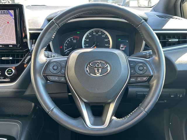 トヨタ カローラ スポーツ ハイブリッドG 大阪府 2018(平30)年 2.7万km ホワイトパールクリスタルシャイン 純正9インチナビ(フルセグ/Bluetooth/CD/DVD)/ブラインドスポットモニター/レーダークルーズコントロール/バックカメラ/衝突被害軽減システム/横滑り防止装置/レーンキープアシスト/コーナーセンサー/オートマチックハイビーム/オートライト/純正LEDライト/フロントフォグランプ/純正AW（16inch)/純正フロアマット/ビルトインEC/ドライブレコーダー/スペアキー1本