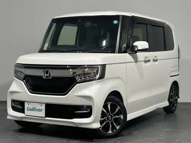 ホンダ Ｎ ＢＯＸ カスタム G L ホンダセンシング 愛媛県 2017(平29)年 5.3万km プレミアムホワイトパールⅡ ・８型ナビ/（フルセグＴＶ・ＢＴ・ＣＤ・ＤＶＤ・ＦＭ・ＡＭ・ＵＳＢ・ａｐｐｌｅｃａｒｐｌａｙ）/・バックカメラ　/・ＥＴＣ　/・前方ドラレコ　/・衝突軽減ブレーキ　/・レーンキープアシスト　/・レーダークルーズコントロール/・両側電動ドア/・USB充電/・ステアリングリモコン/・LEDヘッドライト/・スペアキー