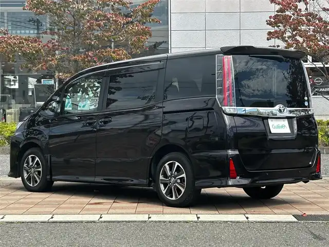 トヨタ ノア Si 福島県 2019(令1)年 0.9万km ボルドーマイカメタリック ワンオーナー/フリップダウンモニター/両側パワースライドドア/純正メモリーナビ(NSZT-Y68T)/(AM/FM/Bluetooth/フルセグTV/DVD)/バックカメラ/前方ドライブレコーダー/ビルトインETC/TOYOTA Safety Sense P/・レーダークルーズ コントロール/・プリクラッシュセーフティ/・レーンディパーチャーアラート/・先行車発進告知機能/・オートマチックハイビーム/横滑り防止装置/クリアランスソナー/純正16インチアルミホイール/純正LEDライト/純正フォグランプ/スマートキー/スペアキー1本/純正フロアマット/取扱説明書/保証書