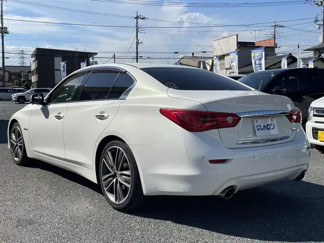 日産 スカイライン ハイブリッド 350GT Type SP 埼玉県 2014(平26)年 13.8万km クリスタルホワイトパール (株)IDOMが運営する【じしゃロン川越店】の自社ローン専用車両になります。こちらは現金またはオートローンご利用時の価格です。自社ローンご希望の方は別途その旨お申付け下さい/純正ナビ/フルセグ/Bluetooth/CD/DVD/AM/FM/アラウンドビューモニター/衝突軽減ブレーキ/レーンキープアシスト/レザーシート/左右パワーシート＆シートヒーター/シートメモリー/パドルシフト/コーナーセンサー/LEDヘッドライト/フォグ/レーダークルーズコントロール/ウインカーミラー/ステアリングリモコン/ドアバイザー/社外フロアマット/ハンドルカバー/車両取扱説明書