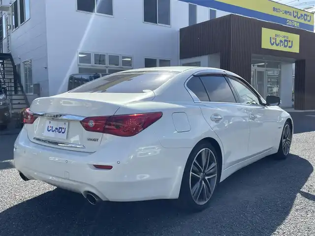 日産 スカイライン ハイブリッド 350GT Type SP 埼玉県 2014(平26)年 13.8万km クリスタルホワイトパール (株)IDOMが運営する【じしゃロン川越店】の自社ローン専用車両になります。こちらは現金またはオートローンご利用時の価格です。自社ローンご希望の方は別途その旨お申付け下さい/純正ナビ/フルセグ/Bluetooth/CD/DVD/AM/FM/アラウンドビューモニター/衝突軽減ブレーキ/レーンキープアシスト/レザーシート/左右パワーシート＆シートヒーター/シートメモリー/パドルシフト/コーナーセンサー/LEDヘッドライト/フォグ/レーダークルーズコントロール/ウインカーミラー/ステアリングリモコン/ドアバイザー/社外フロアマット/ハンドルカバー/車両取扱説明書