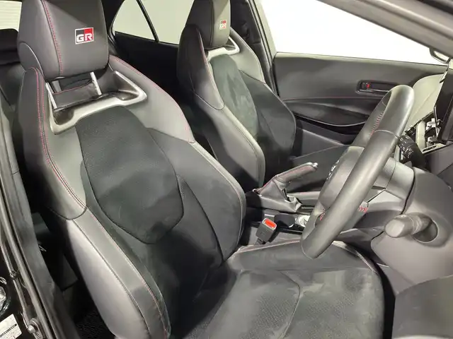 トヨタ ＧＲカローラ RZ 神奈川県 2023(令5)年 2.4万km プレシャスブラックパール 純正8型ディスプレイオーディオ/フルセグ　Bluetooth　AM　FM　Miracast/セーフティセンス/プリクラッシュセーフティ/レーントレーシングアシスト/レーンディパーチャーアラート/レーダークルーズコントロール/ロードサインアシスト/プロアクティブドライビングアシスト/発進遅れ告知機能/オートマチックハイビーム/インテリジェントマニュアルトランスミッション/ハーフレザーシート/革巻きステアリング/純正DA連動ドライブレコーダー/社外前後ドライブレコーダー/純正ビルトインETC2.0/前席/後席USB電源ソケット/DRIVEMODE/SOSコール/プッシュスタート/スマート気ー/純正サイド/リアスポイラー/純正18インチアルミホイール/LEDヘッド/フロントフォグ/クリアランス/デイ/リアコンビネーションランプ/オートライト