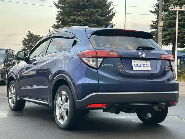 ホンダ ヴェゼル ハイブリッド X Lパッケージ 道北・旭川 2014(平26)年 12.5万km モルフォブルーP (株)IDOMが運営する【じしゃロン旭川店】の自社ローン専用車両になります。こちらは現金またはオートローンご利用時の価格です。自社ローンご希望の方は別途その旨お申付け下さい/　/・純正ナビ(CD/DVD/BT/SD/フルセグ)/・バックカメラ/・ETC/・レーダーブレーキ/・クルーズコントロール/・パドルシフト/・ステアリングリモコン/・両席シートヒーター/・電動格納ウィンカーミラー/・プッシュスタート/・スマートキー2個/・フォグランプ/・取扱説明書