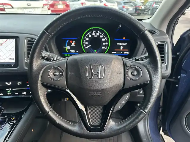 ホンダ ヴェゼル ハイブリッド X Lパッケージ 道北・旭川 2014(平26)年 12.5万km モルフォブルーP (株)IDOMが運営する【じしゃロン旭川店】の自社ローン専用車両になります。こちらは現金またはオートローンご利用時の価格です。自社ローンご希望の方は別途その旨お申付け下さい/　/・純正ナビ(CD/DVD/BT/SD/フルセグ)/・バックカメラ/・ETC/・レーダーブレーキ/・クルーズコントロール/・パドルシフト/・ステアリングリモコン/・両席シートヒーター/・電動格納ウィンカーミラー/・プッシュスタート/・スマートキー2個/・フォグランプ/・取扱説明書