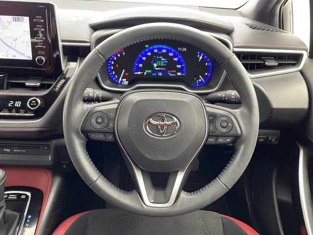 トヨタ カローラ スポーツ ハイブリッドG Z 千葉県 2021(令3)年 1.7万km プラチナホワイトパールマイカ 衝突軽減ブレーキ/レーンキープアシスト/レーダークルーズコントロール/コーナーセンサー/純正メモリナビゲーション/ETC/バックカメラ/純正ドライブレコーダー/ハーフレザーシート/前席シートヒーター/LEDヘッドライト/オートライト/オートハイビーム/純正18インチアルミホイール/プッシュスタート/スマートキー