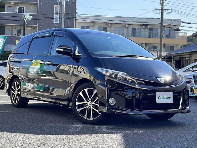 トヨタ エスティマ アエラス レザーパッケージ 大阪府 2013(平25)年 2.5万km ブラック 純正ナビ/バックカメラ/フルセグTV/純正フリップダウンモニター/両側パワースライドドア/前席シートヒーター/黒革シート/革巻きステアリング/HIDヘッドライト/フォグランプ/運転席パワーシート/純正マット/ドアバイザー/保証書/取扱説明書/スペアキー1本