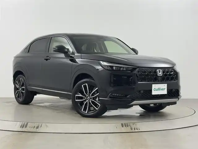 ホンダ ヴェゼル ハイブリッド e:HEV Z 埼玉県 2025(令7)年 0.1千km クリスタルブラックパール Honda CONNECTディスプレイオーディオ/（BT/Apple CarPlay/Android Auto/フルセグTV）/バックカメラ/ホンダセンシング/・衝突被害軽減ブレーキ/・誤発進抑制機能/・路外逸脱抑制機能/・アダプティブクルーズコントロール/ハーフレザーシート/シートヒーター/ハンドルヒーター/ETC2.0車載器/ワイヤレス充電器/フロントグリルベルリナブラック(41250円)