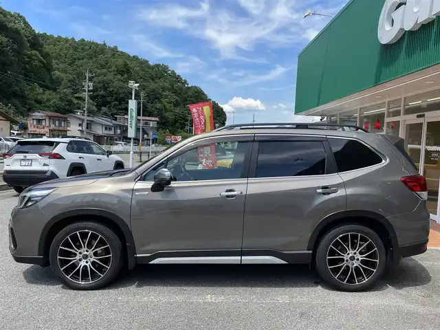 スバル フォレスター ハイブリッド アドバンス 岐阜県 2019(平31)年 9万km セピアブロンズM ４WD/ワンオーナー/SDナビ　（CN-LR840D）/フルセグテレビ/AM.FMラジオ/Bluetooth/ETC/ステアリングヒーター/レザーシート/パワーシート/シートヒーター/ブラインドスポットモニター/パワーバックドア/ドライブレコーダー/バック・サイドカメラ/ウインカーミラー/ステアリング連動ヘッドランプ/フォグランプ/クルーズコントロール（追従走行あり）/積み込み純正AWタイヤ4本/積み込みグリルガード/ルーフレール/純正エンジンスターター/取扱説明書/保証書/スペアキー