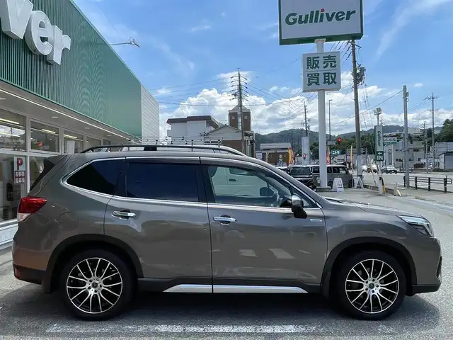 スバル フォレスター ハイブリッド アドバンス 岐阜県 2019(平31)年 9万km セピアブロンズM ４WD/ワンオーナー/SDナビ　（CN-LR840D）/フルセグテレビ/AM.FMラジオ/Bluetooth/ETC/ステアリングヒーター/レザーシート/パワーシート/シートヒーター/ブラインドスポットモニター/パワーバックドア/ドライブレコーダー/バック・サイドカメラ/ウインカーミラー/ステアリング連動ヘッドランプ/フォグランプ/クルーズコントロール（追従走行あり）/積み込み純正AWタイヤ4本/積み込みグリルガード/ルーフレール/純正エンジンスターター/取扱説明書/保証書/スペアキー